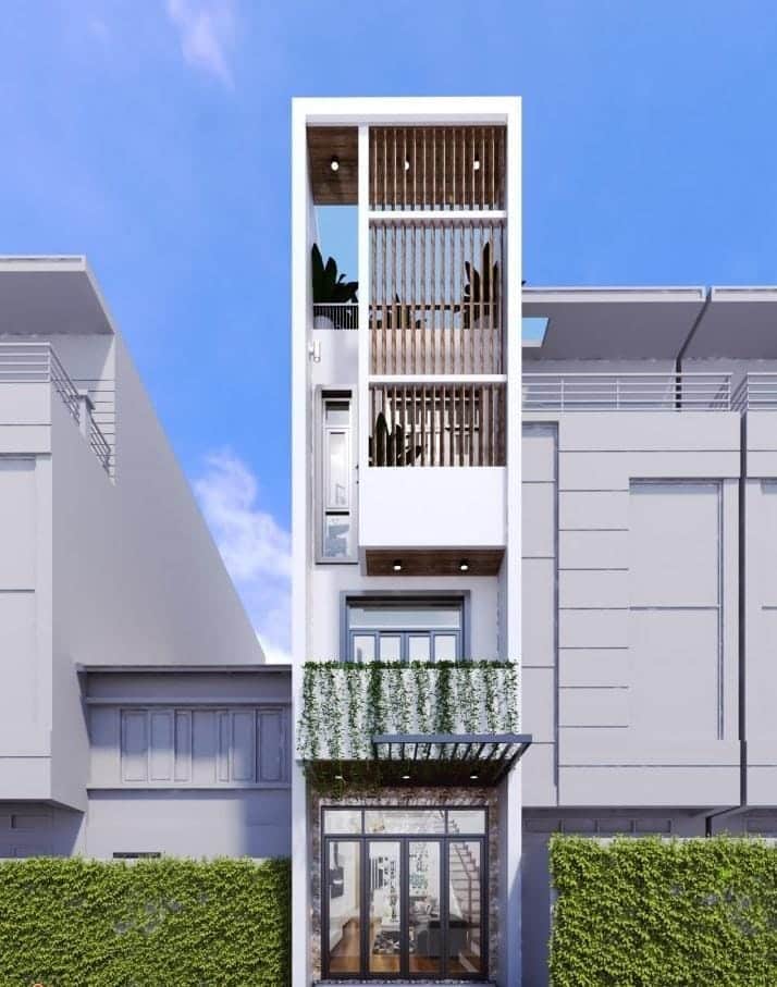 Nhà 4 tầng dạng ống lắp lam gỗ trang trí mặt tiền